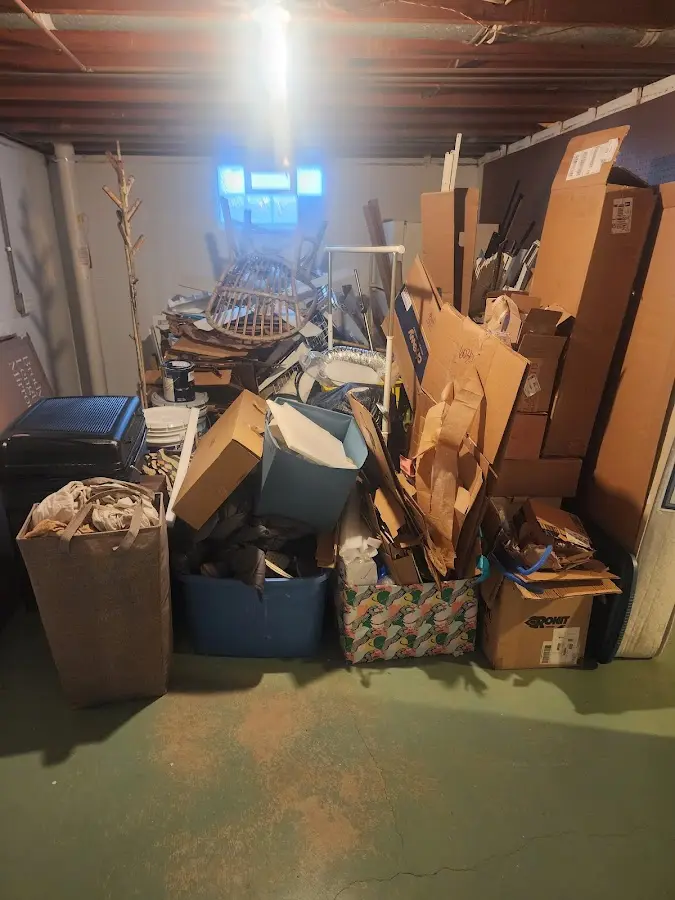 Roll-off dumpster container at job site for 20 Yard Dumpster Rental in L'Anse